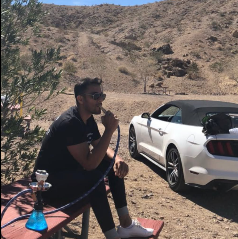 Sam Merchant smoking hookah