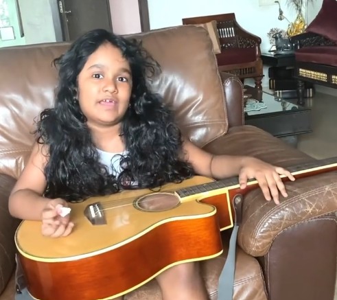 Vanshika Kaushik Playing Guitar