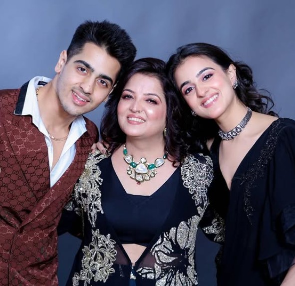 Divita with her mother and brother