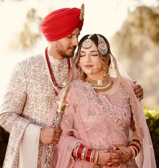 Pranay Pachauri with his wife Sehaj Kaur Maini in a wedding photo