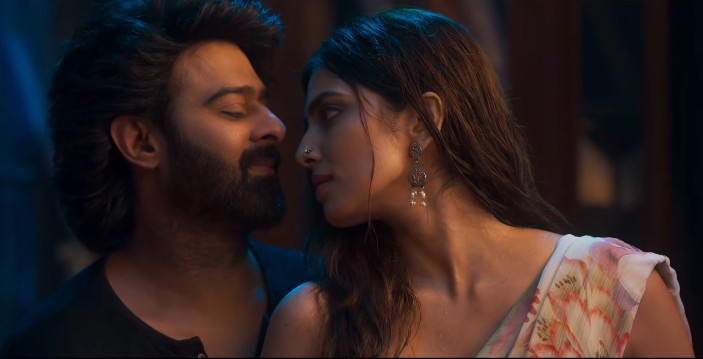 Malavika Mohanan with Prabhas in a scene from the film 'The Raja Saab'